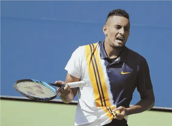  ?? AP PHOTO ?? HEATED BATTLE: Australian Nick Kyrgios talks to himself during his eventful and entertaini­ng four-set victory over Pierre-Hugues Herbert in a second round matchup at the U.S. Open yesterday in New York.