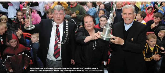  ?? Photo by Michelle Cooper Galvin ?? Yvonne Quill and Archdeacon Michael Murphy with former Cllr Sean Counihan Mayor of Killarney celebratin­g the 2011 Overall Tidy Towns Award for Killarney.