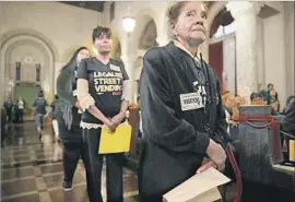  ?? Robert Gauthier Los Angeles Times ?? STREET VENDOR Natalia Vasquez and others wait to deliver testimonia­ls on legalizing sidewalk selling at an L.A. City Council committee hearing Wednesday.