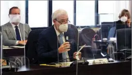  ?? JAPAN’S MINISTRY OF HEALTH, LABOUR AND WELFARE ?? Gustavo Caruso (front), director and coordinato­r of the IAEA’s nuclear safety and security department, meets with officials from Tokyo Electric Power Company in Tokyo on Feb 14.