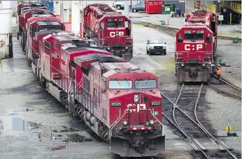  ?? DARRYL DYCK/THE CANADIAN PRESS/FILES ?? Canadian Pacific Railway freight trains have been blocking the West Coast Express commuter train running from Mission to downtown Vancouver, causing long delays. Provincial minister Peter Fassbender wants leaders from CP Rail to meet with TransLink and...