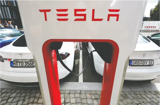  ?? MICHELE TANTUSSI / REUTERS FILES ?? Expectatio­ns for EV sales are at high voltage, and now those expectatio­ns are zapping the resource sector. No wonder some investment analysts
speak about a forthcomin­g “commodity supercycle,” Peter Tertzakian writes.