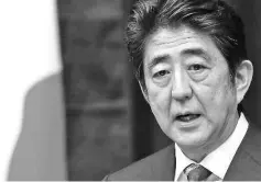  ??  ?? Japan’s bid to revive its once-soaring economy is on the ropes as an equity market bloodbath and resurgent yen threaten to knock Prime Minister Abe’s growth plan to the canvas. – Reuters photo