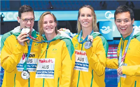  ?? Picture: AFP ?? SILVER STREAKS: Mitchell Larkin, Bronte Campbell, Emma McKeon and Daniel Cave after the mixed 4x100 medley.