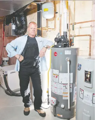  ?? ALEX SCHULDTZ/THE HOLMES GROUP ?? “Look for signs of leaks around fixtures, faucets and appliances,” Mike Holmes says.