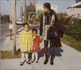  ?? COURTESY OF KAMALA HARRIS ?? Kamala Harris, left, with her sister, Maya, and mother, Shyamala Gopalan. After her parents divorced, Harris lived with her mom, whom she describes as her biggest influence.