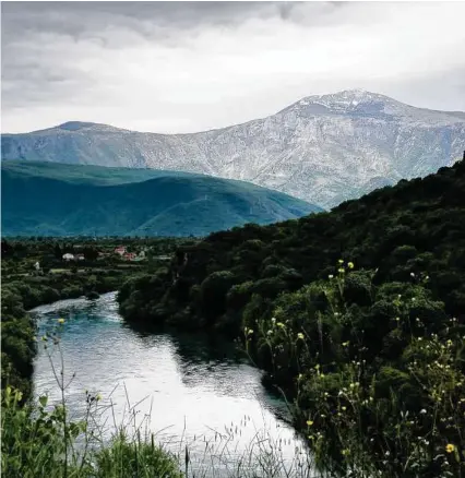  ?? Photos by Susan Wright / New York Times ?? The river Neretva near Mostar. Mostar sustained some of the most intense bombing in the 1990s war.