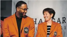  ?? JESSICA HILL/THE ASSOCIATED PRESS ?? Tracy McGrady and Notre Dame coach Muffet McGraw are among the 2017 Basketball Hall of Fame inductees.