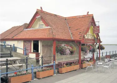  ??  ?? The Lakeside Inn looks across Southport’s Marine Lake