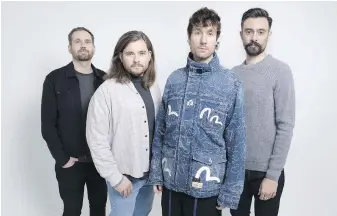  ?? SCOTT GARFITT, THE ASSOCIATED PRESS ?? From left: Will Farquarson, Chris Wood, Dan Smith and Kyle Simmons of Bastille. The band’s fourth studio album dives into the world of science-fiction.