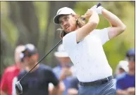  ?? Sam Greenwood / Getty Images ?? Tommy Fleetwood plays his shot from the ninth tee during the first round of The Players Championsh­ip on The Stadium Course at TPC Sawgrass on Thursday in Ponte Vedra Beach, Fla.