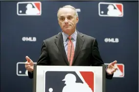  ?? ASSOCIATED PRESS FILE ?? Commission­er Rob Manfred speaks to the media at the owners meeting in Arlington, Texas, on Nov. 21, 2019.