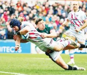  ?? ?? Crashing home: Harry Thacker gets past Ben Youngs to score for Bristol