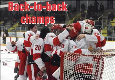  ?? NEWS PHOTO RYAN MCCRACKEN ?? The St. George’s School Saints celebrate after winning the 46th annual Hockey Hounds Major Bantam Hockey Tournament with a 5-3 victory over Calgary Edge in Sunday’s championsh­ip game at the Kinplex.