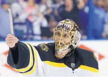  ?? CHRIS O’MEARA/ASSOCIATED PRESS ?? Boston Bruins goaltender Tuukka Rask tries to show officials the blade from his broken skate during the second period of Saturday’s 6-2 win over Tampa Bay in Game 1 of their Eastern Conference series.