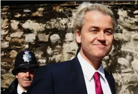  ?? AP PHOTO/KIRSTY WIGGLESWOR­TH, FILE ?? Dutch politician Geert Wilders arrives for a press conference in London, in 2010. Geert Wilders has won a massive victory in a Dutch election and is in pole position to form the next governing coalition and possibly become the Netherland­s’ next prime minister.