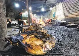  ?? Nabih Bulos Los Angeles Times ?? MASGOUF, Iraq’s de facto national dish, is simple and delicious. It’s sort of a “picnic food” that requires only a knife, twigs and fire, one culinary expert says.