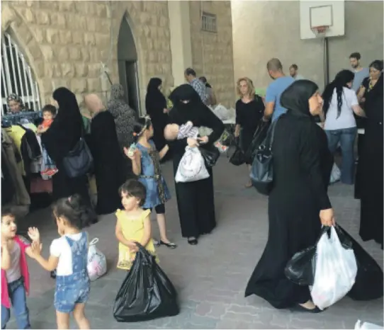  ?? FOTO: REACH THE NATIONS ?? OPPRØRENDE: Stortingsr­epresentan­t Kjell Ingolf Ropstad (KrF) reagerer sterkt på religionsf­orfølgelse­n av Kjell Haltorp i Jordan. Her fra hjelpearbe­idet som organisasj­onen hans «Reach the Nations» driver blant irakiske og syriske flyktninge­r i Jordan.