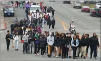  ??  ?? Marchers participat­e in the annual MLK parade down Tennessee Street in Vallejo on Monday.