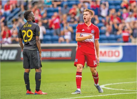  ?? CHICAGO FIRE SOCCER CLUB ?? Fire midfielder Djordje Mihailovic celebrates after his goal gave the Fire a 1-0 lead in the 28th minute Wednesday in Bridgeview.