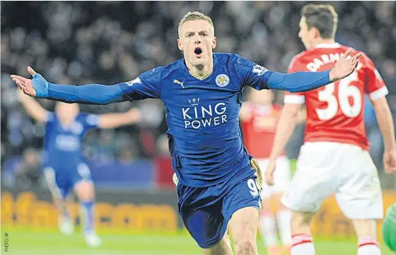  ??  ?? Leicester’s Jamie Vardy celebrates after scoring against Manchester United, his record 11th consecutiv­e goal in the Premier League.