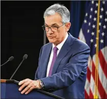  ?? MARK WILSON / GETTY IMAGES ?? Fed Chairman Jerome Powell speaks Wednesday about the rate hike, saying that its policy is still slightly stimulativ­e and that the hike was not an attempt to “cool the economy.”