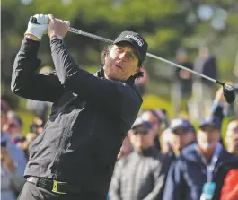  ?? ERIC RISBERG/ASSOCIATED PRESS ?? Phil Mickelson follows his drive from the fourth tee of the Pebble Beach Golf Links during the final round of the AT&amp;T Pebble Beach Pro-Am on Sunday in Pebble Beach, Calif.