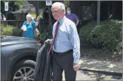  ?? JAKE CRANDALL — THE MONTGOMERY ADVERTISER ?? U.S. Senate candidate Jeff Sessions walks to a car after a press conference at Gail’s Down the Street Cafe in Montgomery, Ala., on Friday.