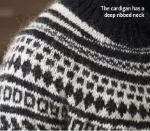  ??  ?? The cardigan has a deep ribbed neck