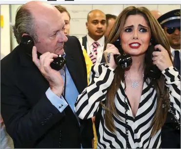  ??  ?? INVESTMENT CALL: City tycoon and Tory donor Michael Spencer with Cheryl Tweedy at a charity event