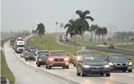  ??  ?? Traffic is seen heading North along the Florida Turnpike near Homestead, Florida, as tourists in the Florida Keys leave town ahead of Hurricane Irma’s arrival.