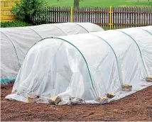  ??  ?? A cold frame or cloche will help warm the soil ready for planting.