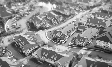  ??  ?? Homes are shown in an aerial photograph taken with a tilt-shift lens above New Jersey on June 10, 2015. — WP-Bloomberg photos