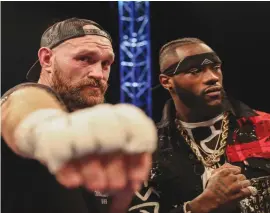  ??  ?? Tyson Fury and Deontay Wilder