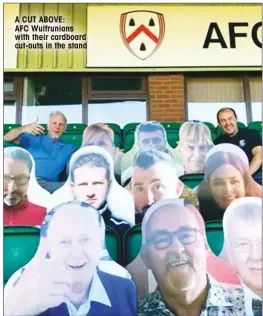  ??  ?? A CUT ABOVE: AFC Wulfrunian­s with their cardboard cut-outs in the stand