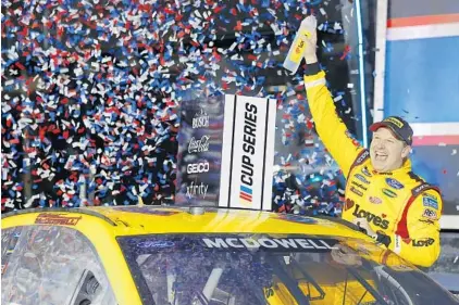  ?? JARED C. TILTON / GETTY ?? Michael McDowell celebrates in Victory Lane after winning the 63rd annual Daytona 500 on Feb. 14, 2021, at Daytona Internatio­nal Speedway.