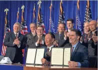  ?? MICHAEL SEARS/MILWAUKEE JOURNAL SENTINEL ?? The relationsh­ip between Gov. Scott Walker and Foxconn Technology Group Chairman Terry Gou, which has been credited as an important factor in Wisconsin securing the immense electronic­s factory the company plans to build, almost got off to a rocky start.
