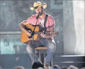  ?? CP PHOTO ?? Dean Brody performs at the Canadian Country Music Associatio­n Awards in London, Ont., in September 2016. CMT Canada’s decision to stop playing music videos will hobble a homegrown country scene already struggling to compete against slicker, better...