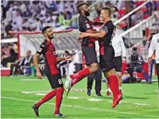  ?? Virendra Saklani/Gulf News ?? Jump-start Rodrigo Lima (right) of Al Ahli celebrates his goal against Al Nasr in the Arabian Gulf League match on Friday night.