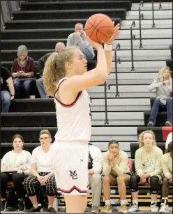  ?? KAYLNN PHILLIPS/ SPECIAL TO MCDONALD COUNTY PRESS ?? McDonald County’s Samara Smith shoots a free throw against Neosho in a game earlier this season.