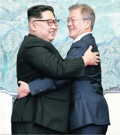  ?? KOREA SUMMIT PRESS POOL / GETTY IMAGES ?? North Korean leader Kim Jong Un, left, and South Korean President Moon Jae-in after signing the Panmunjom Declaratio­n for Peace, Prosperity and Unificatio­n of the Korean Peninsula.