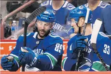  ?? RICHARD LAM FILES ?? The Canucks tried to kickstart some offence from Sam Gagner, left, by playing him with Henrik, right, and Daniel Sedin late in the season, but the versatile forward put up only 31 points in 2017-18.