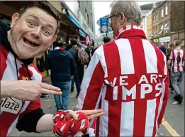  ??  ?? TAKING OVER: Lincoln supporters fill the streets around the Emirates