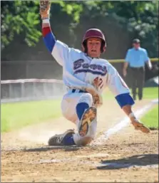  ?? THOMAS NASH — DIGITAL FIRST MEDIA ?? Boyertown’s Michael Raineri slides in safely during the fourth inning of Sunday’s game.