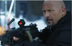  ?? UNIVERSAL PICTURES VIA THE ASSOCIATED PRESS ?? The Fate of Furious, starring Dwayne Johnson, had the biggest global box-office debut in history, taking in about $100 million in North America on opening weekend.