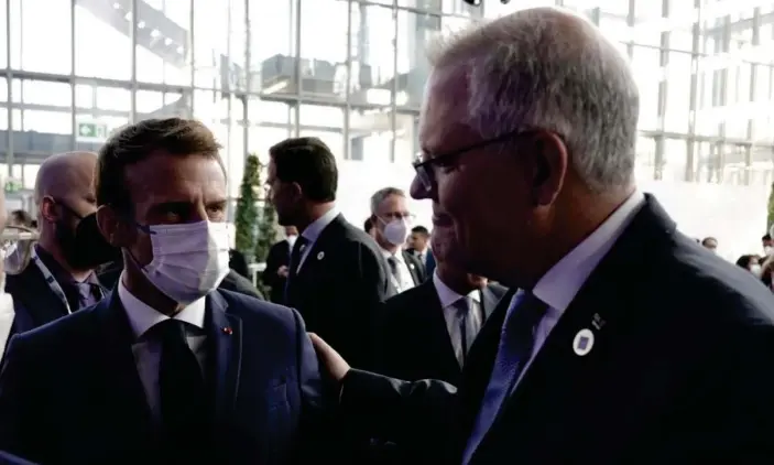  ?? Photograph: Prime Minister’s Office/ Adam Taylor ?? Scott Morrison (right) with French president Emmanuel Macron in Rome. Keating said Australia had treated the French ‘appallingl­y’