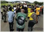  ?? Pictures: Sandile Ndlovu ?? Left, a cooking detail of Umkhonto weSizwe veterans prepares a meal at Nkandla this week. Above, the veterans sing and chant freedom songs near Jacob Zuma’s house. Below, a visitor’s car is checked.