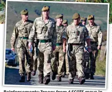  ??  ?? Reinforcem­ents: Troops from 4 SCOTS move in