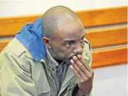  ?? Picture: MICHELLE SOLOMON ?? GUILTY: Bulelani Mabhayi sits in the dock at the Butterwort­h Magistrate’s Court after pleading guilty to 36 criminal charges, 20 of them murder