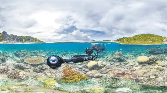  ?? Catlin Seaview Survey / Sundance Institute ?? FOR THE DOCUMENTAR­Y “Chasing Coral,” underwater cameras were set up at the Great Barrier Reef to observe what happens as ocean temperatur­es rise.